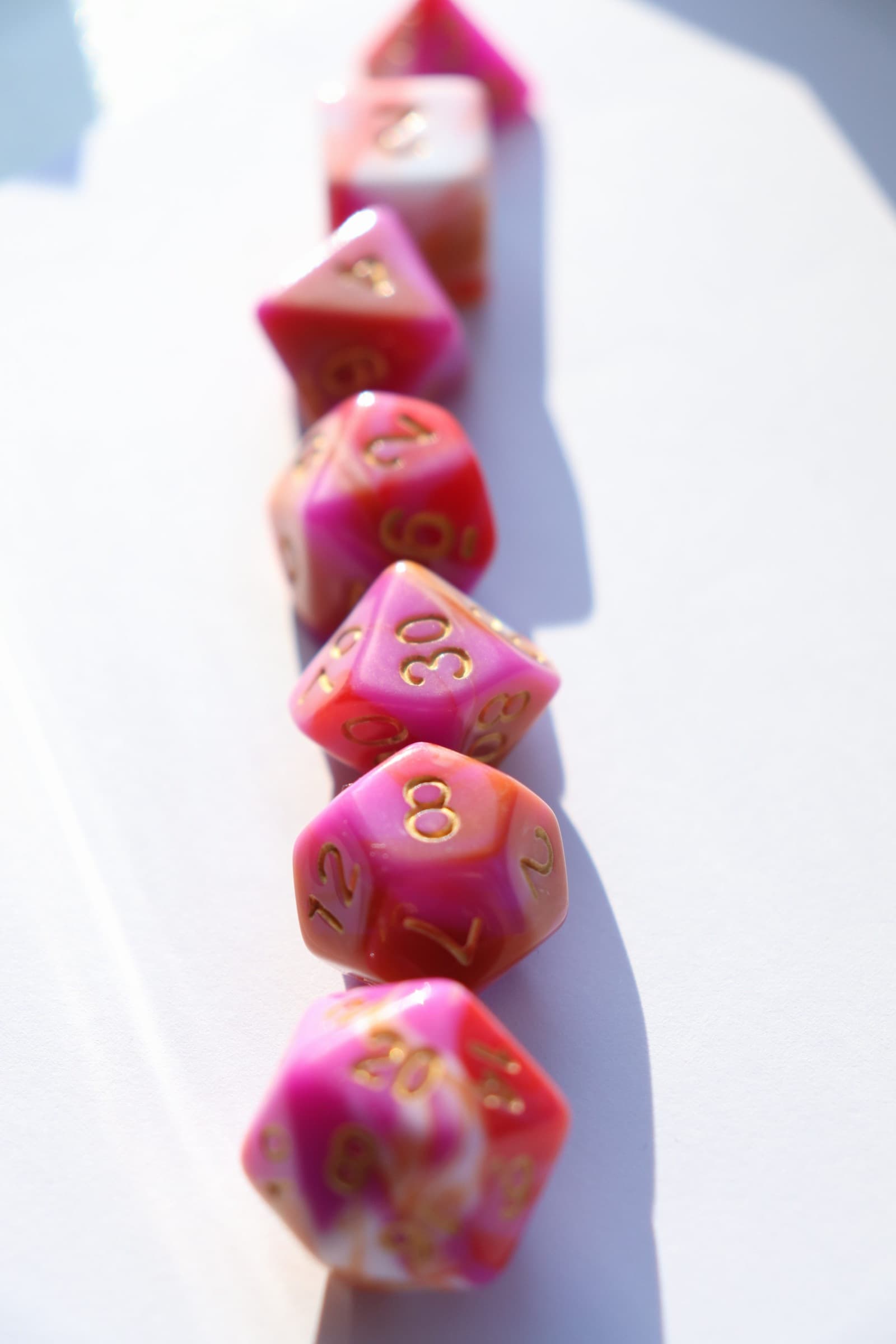 RPG Dice set (7) Blended in roze/wit/oranje