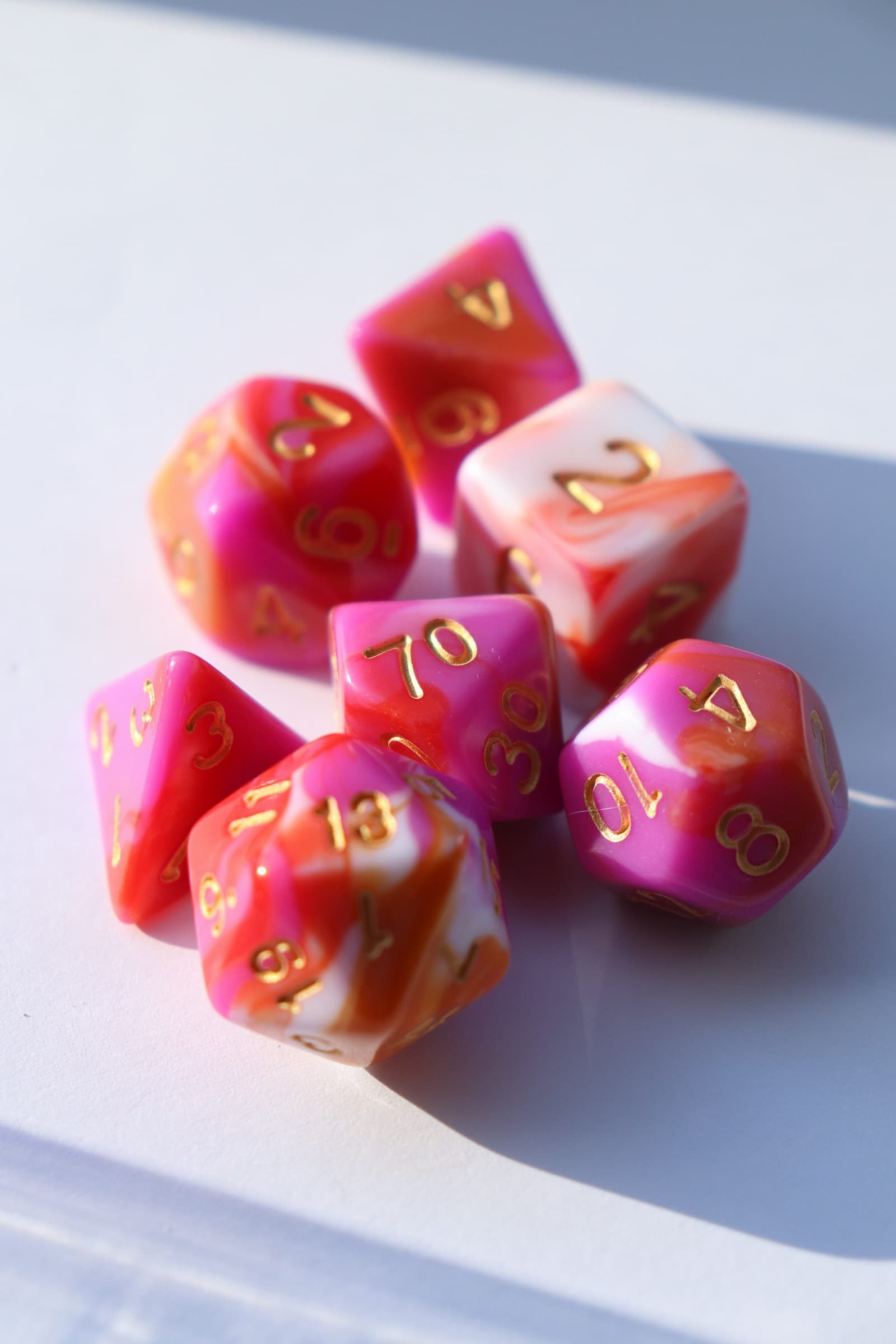 RPG Dice set (7) Blended in roze/wit/oranje